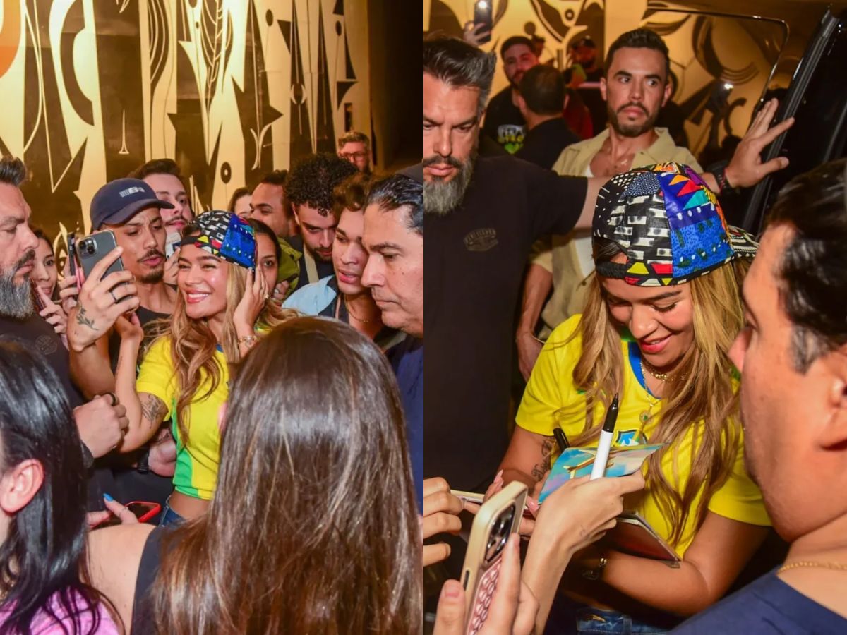 Karol G atrai multidão e esbanja simpatia ao atender fãs em frente a hotel em SP
