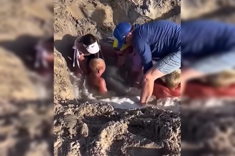 criancas-ficam-presas-em-buraco-na-areia-da-praia-nos-eua.-video