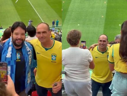 Eduardo Bolsonaro posa com fãs em área VIP de estádio antes de Brasil x Japão na Copa
