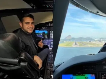 Juliano, dupla de Henrique, mostra habilidade como piloto em pouso no Santos Dumont