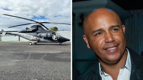 Cantor sertanejo Rick posando antes de embarcar em helicóptero em Santa Catarina.